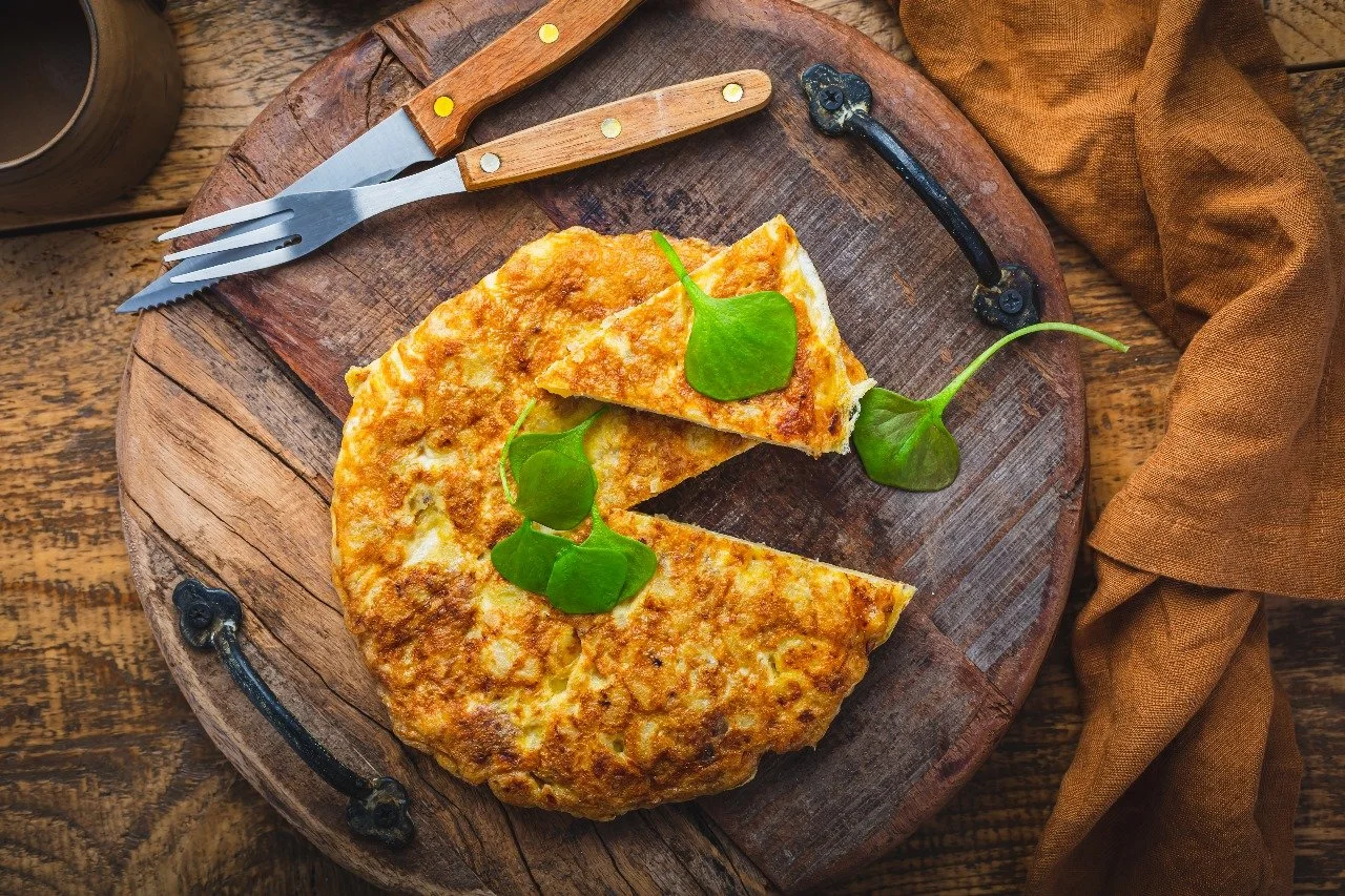  A classic spanish tortilla de patatas, golden and fluffy.  